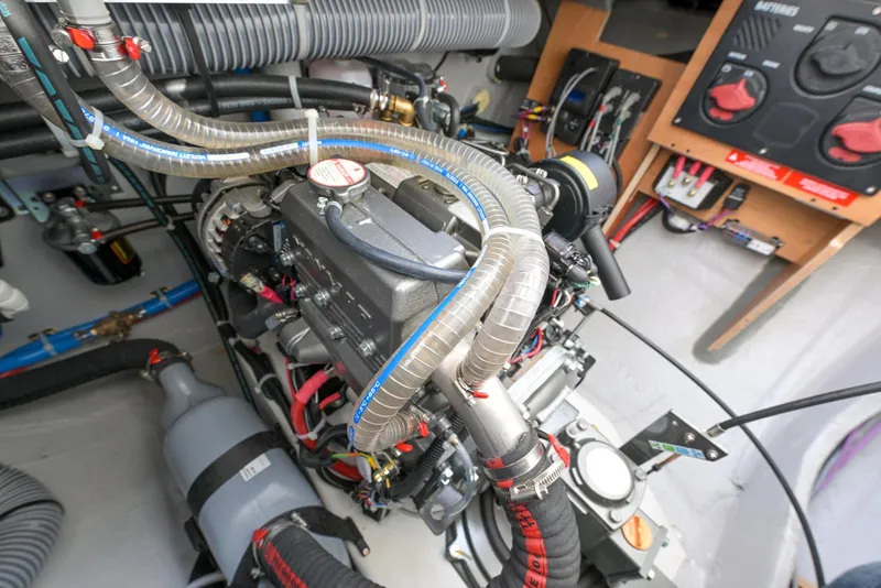 Slide: The Image of Engine room of 2025 Excess 11 yacht, showcasing complex machinery and wiring. - 29