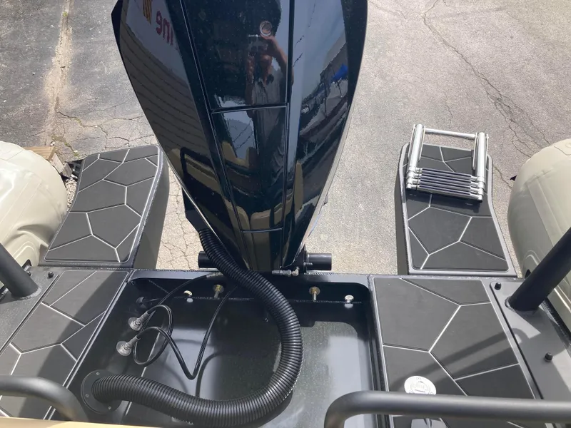 Slide: The Image of Highfield Sport 700 boat dashboard with navigation system and controls, 2025 model. - 13