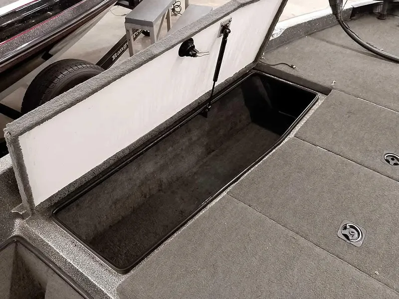 Slide: The Image of Open storage compartment in 1999 Ranger 461VS Comanche boat. - 18