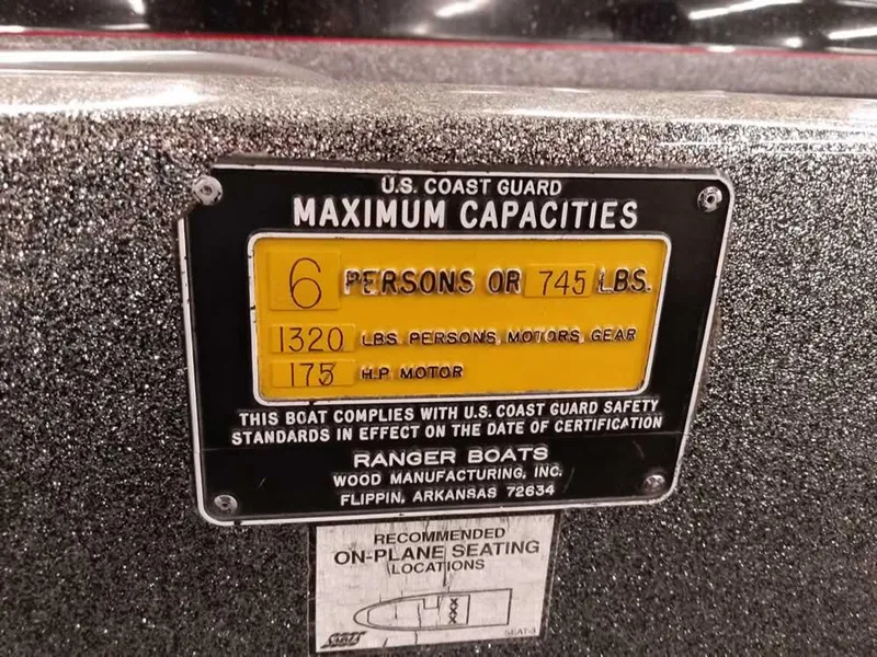 Slide: The Image of 1999 Ranger 461VS Comanche capacity plate, 6 persons or 745 lbs, 175 HP motor. - 24