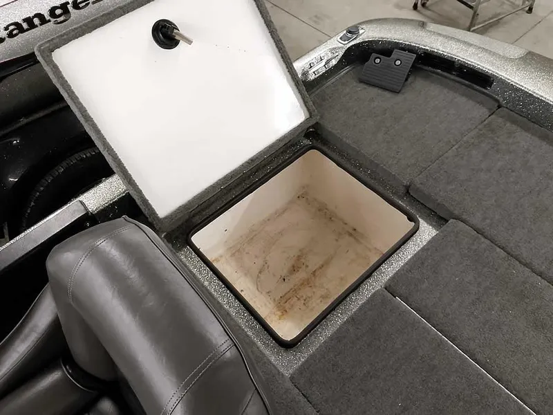 Slide: The Image of Open storage compartment in 1999 Ranger 461VS Comanche boat interior. - 30