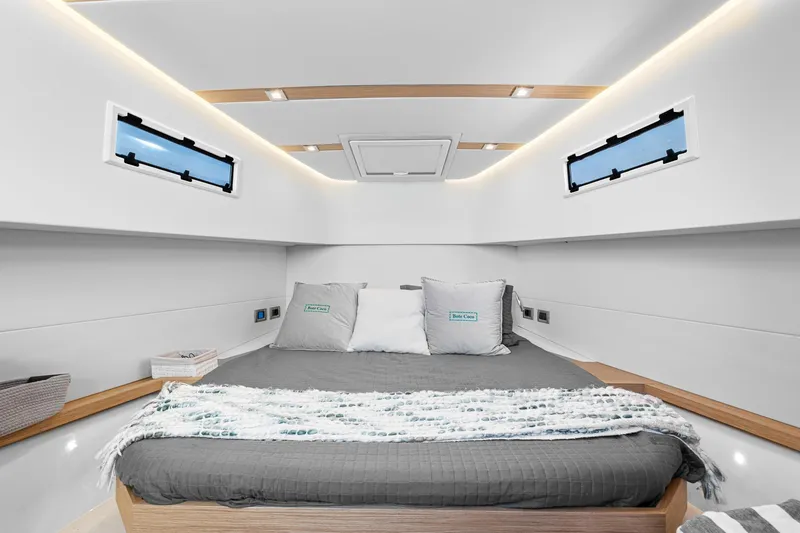 Slide: The Image of Luxurious cabin interior of 2023 Pardo Yachts P38, featuring modern design and cozy bedding. - 21