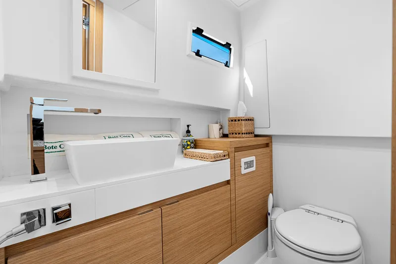 Slide: The Image of Modern bathroom interior on 2023 Pardo Yachts P38, featuring sleek design and wooden cabinetry. - 23