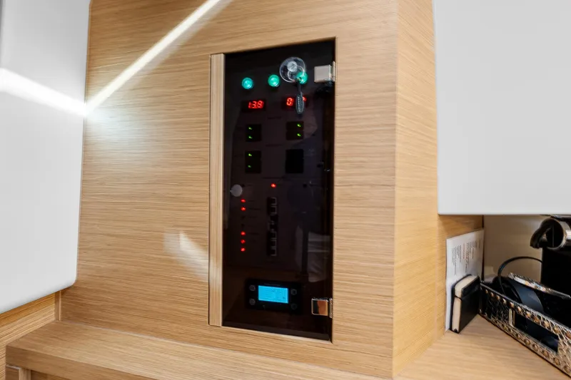 Slide: The Image of Control panel inside 2023 Pardo Yachts P38, featuring modern design and digital displays. - 28