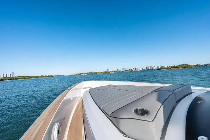 Slide: The Image of 2023 Pardo Yachts P38 cruising on open water under clear blue skies. - 29