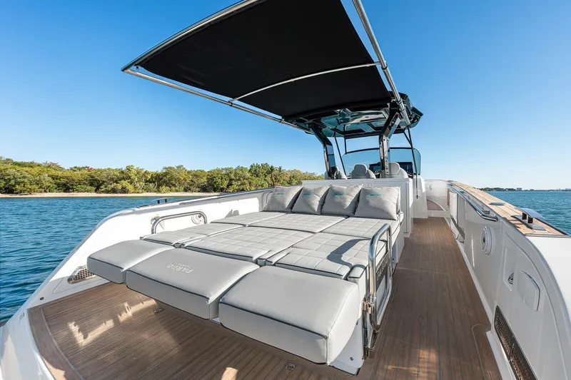 Slide: The Image of 2023 Pardo Yachts P38 with sunbed and canopy on open water. - 33