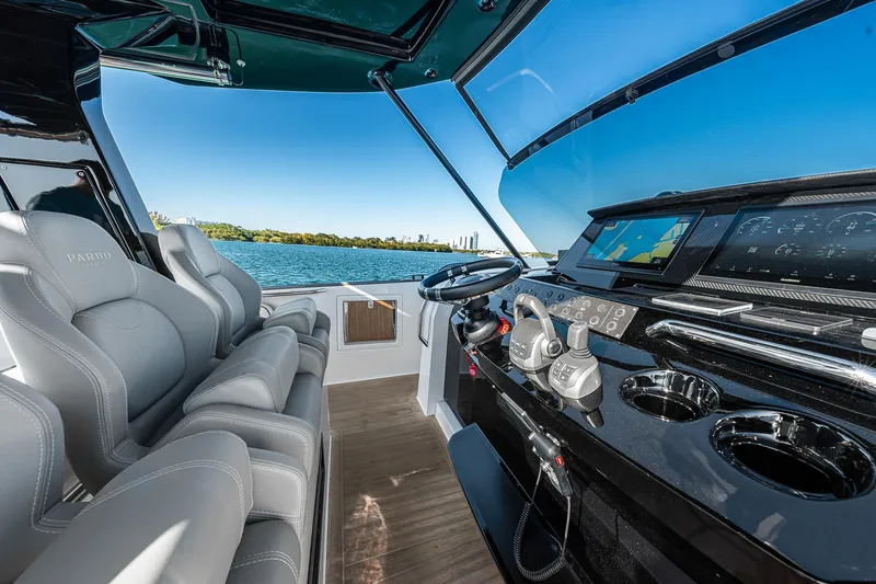 Slide: The Image of 2023 Pardo Yachts P38 cockpit with modern controls and luxurious seating. - 47