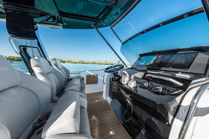 Slide: The Image of Luxurious interior of 2023 Pardo Yachts P38, featuring sleek design and advanced navigation controls. - 48