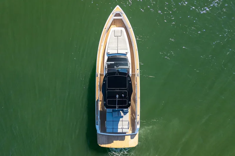Slide: The Image of 2023 Pardo Yachts P38 cruising on green water, aerial view. - 18