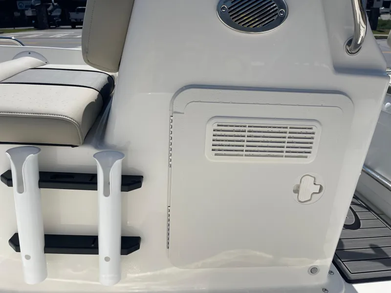Slide: The Image of 2025 Key West 1720 Center Console boat interior with rod holders and seating. - 12