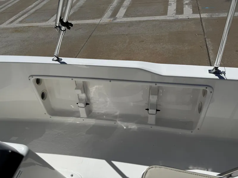 Slide: The Image of 2025 Key West 1720 Center Console boat interior, featuring a clean white deck and seating area. - 19