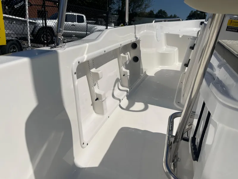 Slide: The Image of 2025 Key West 1720 Center Console boat interior, featuring sleek white design and spacious layout. - 20