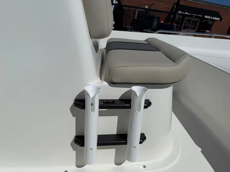 Slide: The Image of 2025 Key West 1720 Center Console boat seat and rod holders detail. - 30