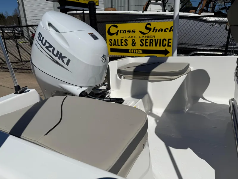 Slide: The Image of 2025 Key West 1720 Center Console boat with Suzuki engine at sales and service center. - 32