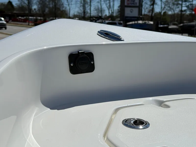 Slide: The Image of 2025 Key West 1720 Center Console boat interior detail with plug and fittings. - 35