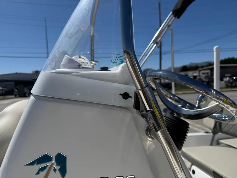 Slide: The Image of 2025 Key West 1720 Center Console boat, close-up of steering console and windshield. - 36