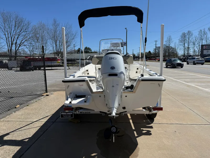 Slide: The Image of 2025 Key West 1720 Center Console boat parked on pavement, rear view. - 4