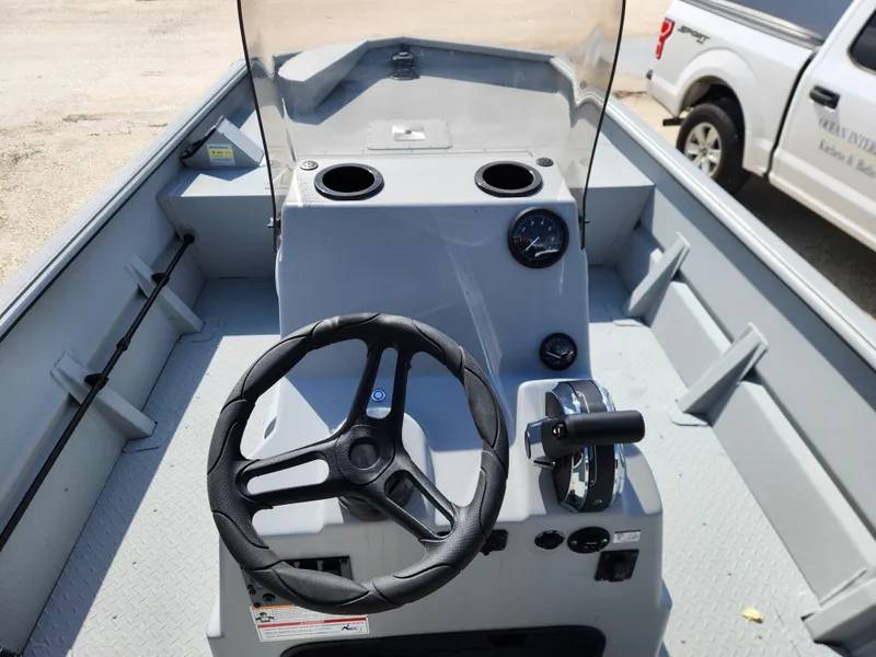 The Image of 2025 SeaArk 1872 MVT boat interior with steering wheel and control panel. - 1
