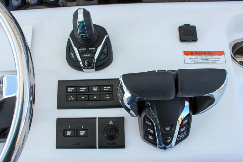 Slide: The Image of Control panel of 2025 Sea Hunt Gamefish 28 Forward Seating boat. - 11