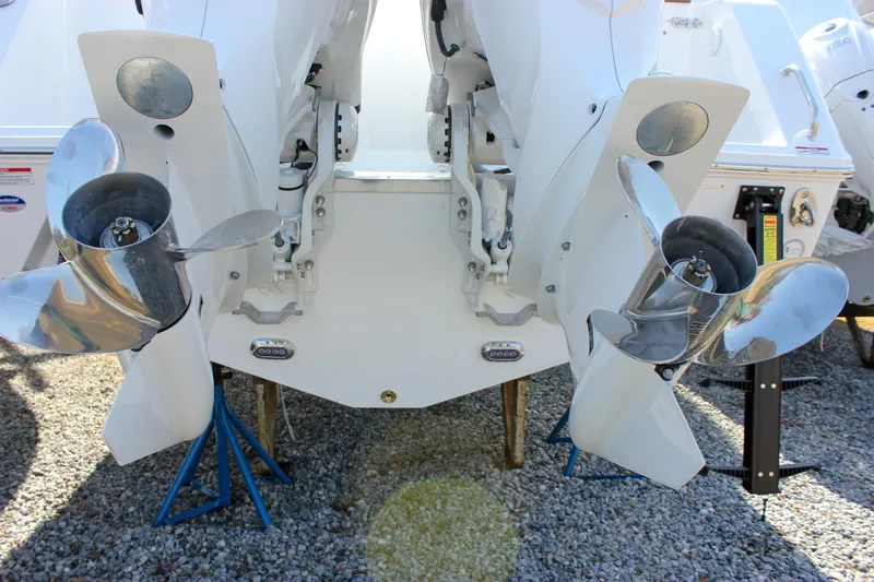 Slide: The Image of 2025 Sea Hunt Gamefish 28 boat with dual outboard engines on display. - 13