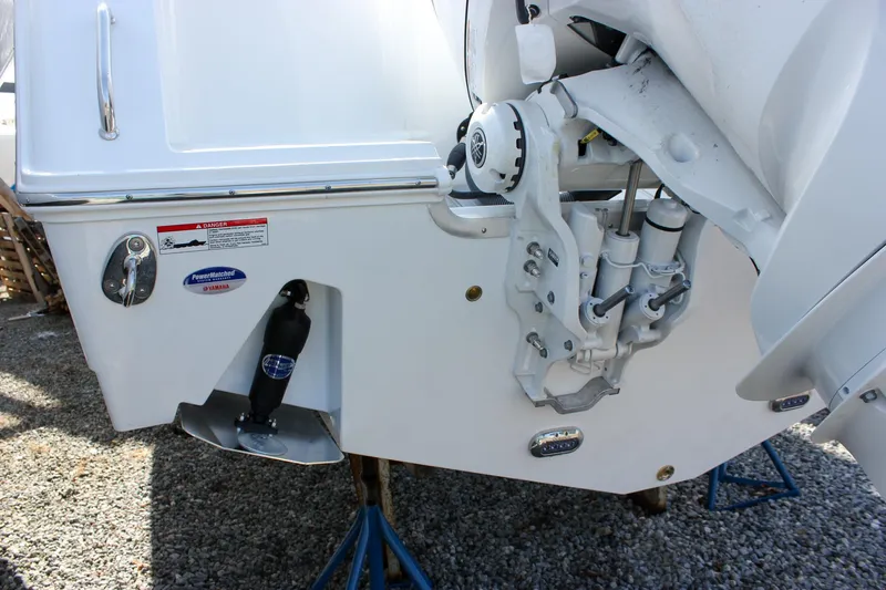 Slide: The Image of 2025 Sea Hunt Gamefish 28 boat engine and transom detail on display. - 14