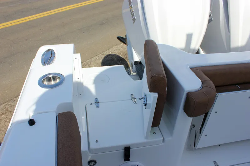 Slide: The Image of 2025 Sea Hunt Gamefish 28 boat interior with seating and storage compartments. - 17