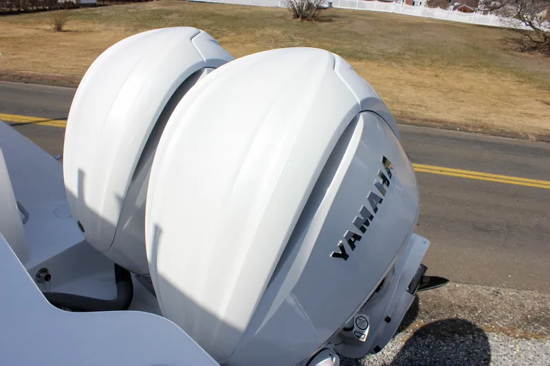 Slide: The Image of Twin Yamaha outboard engines on a 2025 Sea Hunt Gamefish 28 Forward Seating boat. - 21