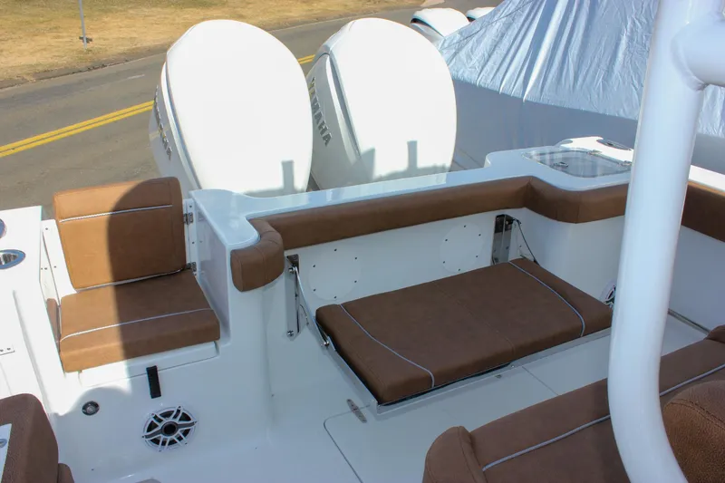 Slide: The Image of 2025 Sea Hunt Gamefish 28 boat with brown seating and dual engines. - 23