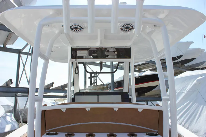 Slide: The Image of 2025 Sea Hunt Gamefish 28 Forward Seating boat with T-top and rod holders. - 28