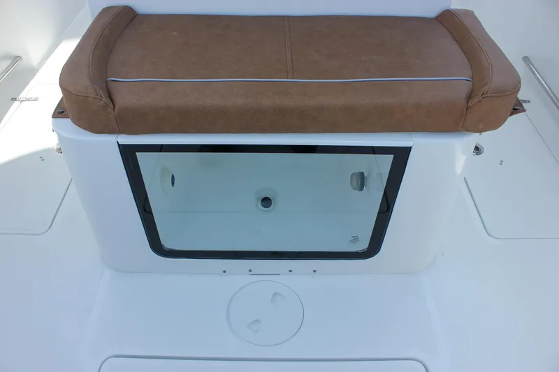 Slide: The Image of 2025 Sea Hunt Gamefish 28 Forward Seating with cushioned bench and storage compartment. - 29