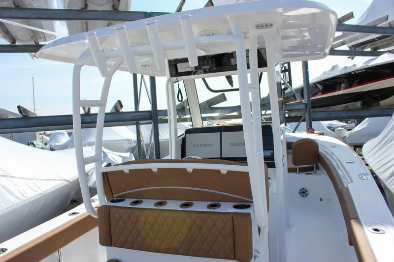 Slide: The Image of 2025 Sea Hunt Gamefish 28 Forward Seating boat with modern helm and seating area. - 4