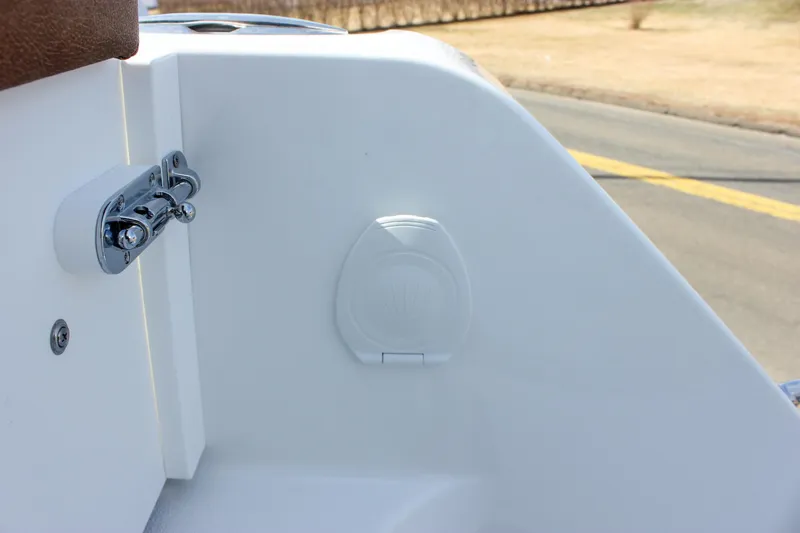 Slide: The Image of 2025 Sea Hunt Gamefish 28 boat detail, featuring a sleek white interior and hardware. - 41