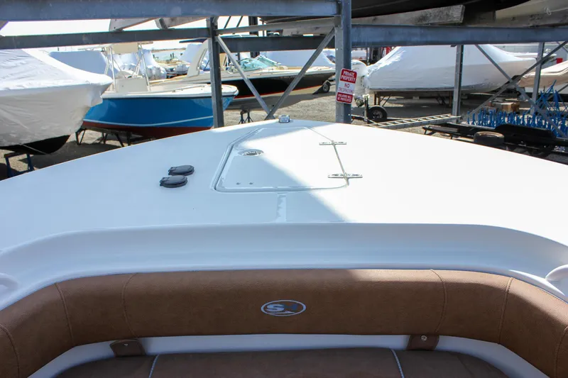 Slide: The Image of 2025 Sea Hunt Gamefish 28 Forward Seating boat, showcasing bow area and seating. - 51