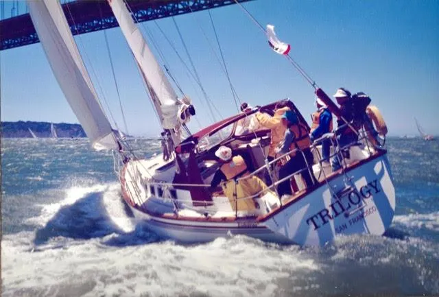 The Image of Sailboat Endeavour 38 navigating choppy waters near a bridge, 1984 model. - 0
