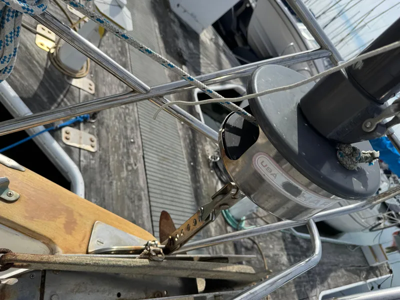 Slide: The Image of Steering wheel and compass on a 1984 Endeavour 38 sailboat. - 10