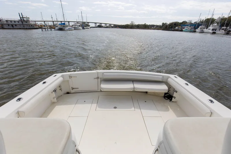 Slide: The Image of 2004 Wellcraft 330 Coastal boat deck with marina view. - 23