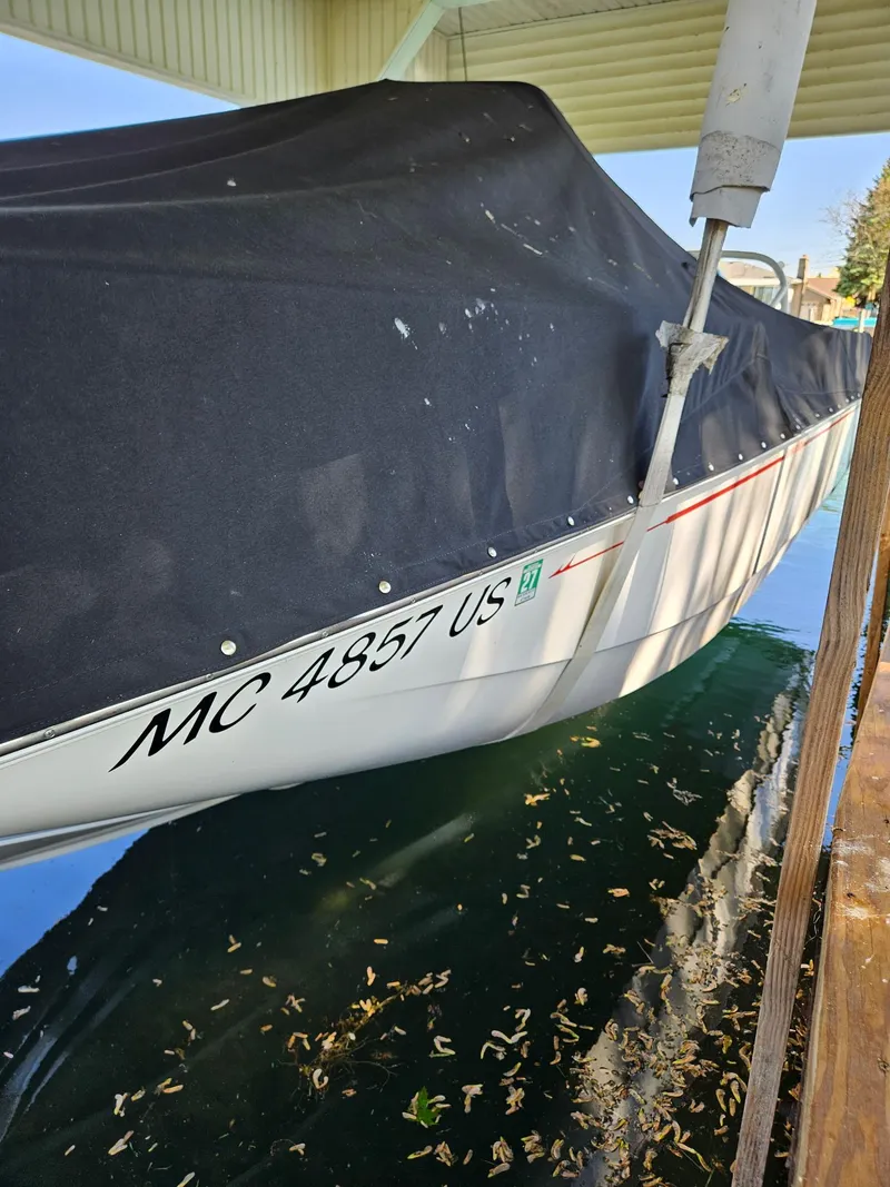 Slide: The Image of Dashboard of a 2022 Boston Whaler 210 Montauk boat with speed and RPM gauges. - 17