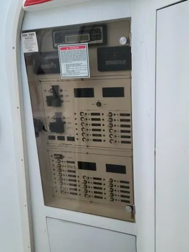Slide: The Image of Electrical control panel on a 2000 Baja 442 boat. - 8