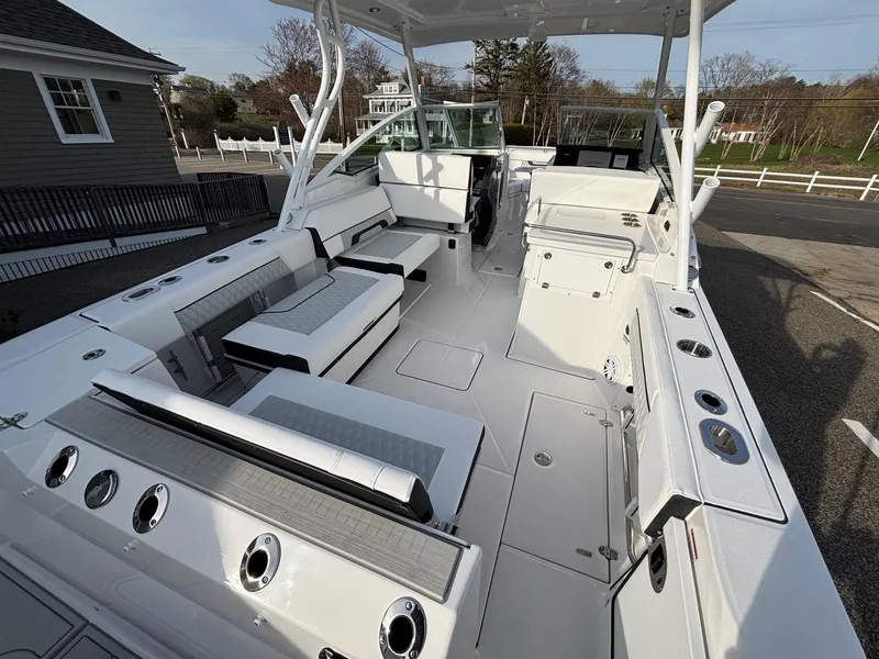 Slide: The Image of 2025 Blackfin 272 DC boat interior with spacious seating and modern design. - 23