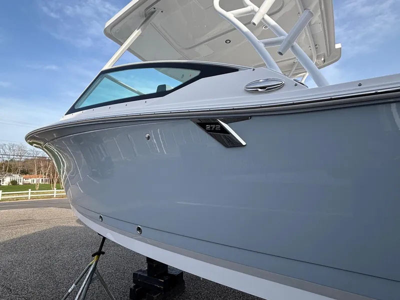 Slide: The Image of 2025 Blackfin 272 DC boat with sleek design and modern features. - 6