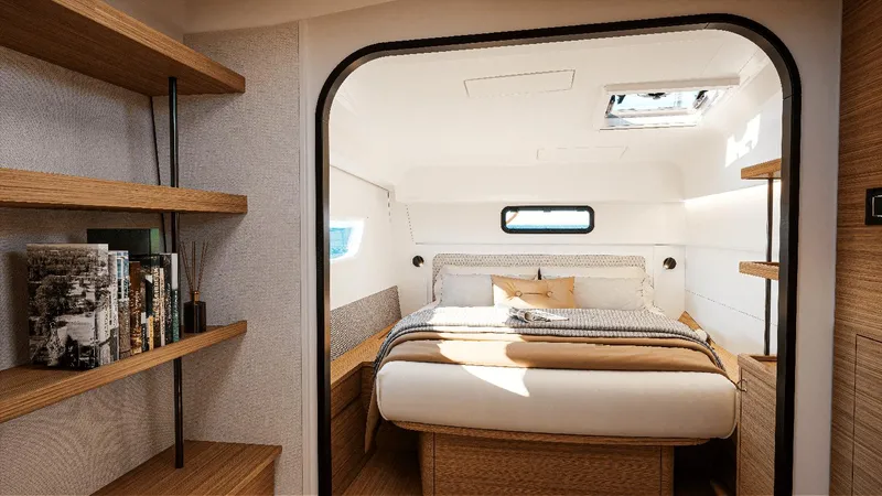 Slide: The Image of Luxurious cabin interior of 2025 Excess 13 yacht, featuring cozy bed and wooden shelves. - 10