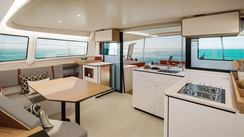 Slide: The Image of Luxurious interior of 2025 Excess 13 catamaran with modern kitchen and ocean view. - 9
