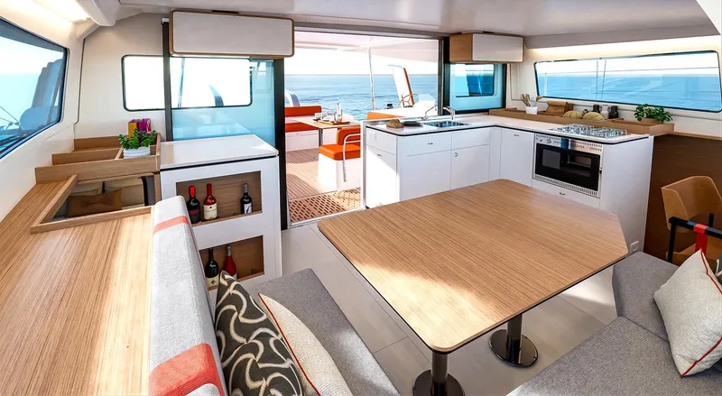 Slide: The Image of Luxurious interior of 2025 Excess 13 catamaran with modern kitchen and dining area. - 7