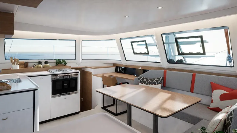 Slide: The Image of Modern interior of 2025 Excess 13 catamaran with kitchen and dining area. - 8