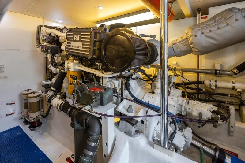 Slide: The Image of Engine room of 1999 West Bay 58 Pilothouse Motor Yacht with CAT marine engine. - 39