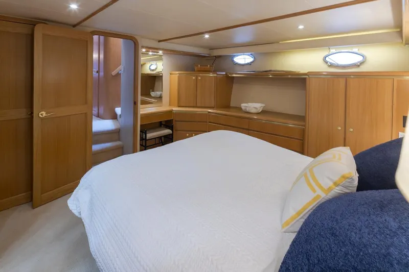 Slide: The Image of Luxurious bedroom interior of 1999 West Bay 58 Pilothouse Motor Yacht. - 42