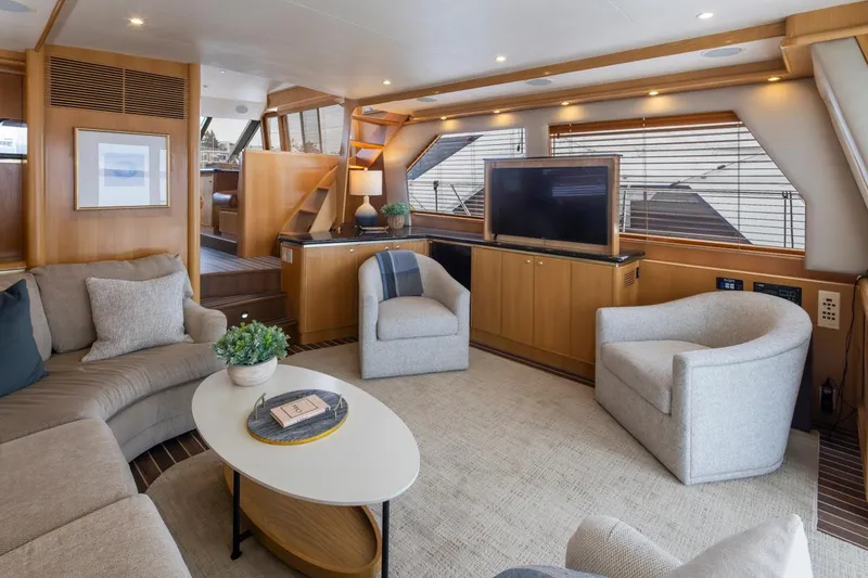 Slide: The Image of Luxurious interior of 1999 West Bay 58 Pilothouse Motor Yacht with modern furnishings. - 6