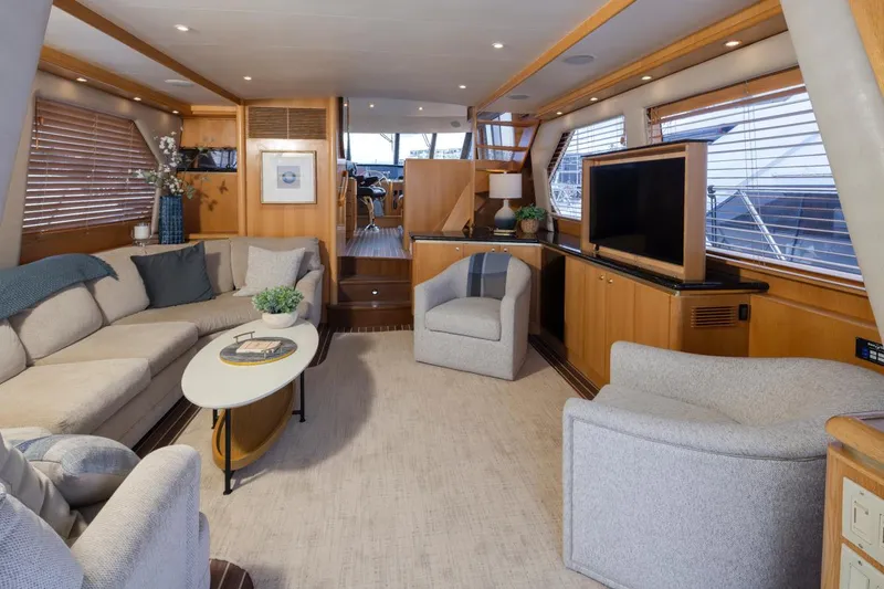 Slide: The Image of Luxurious interior of 1999 West Bay 58 Pilothouse Motor Yacht with modern furnishings. - 7
