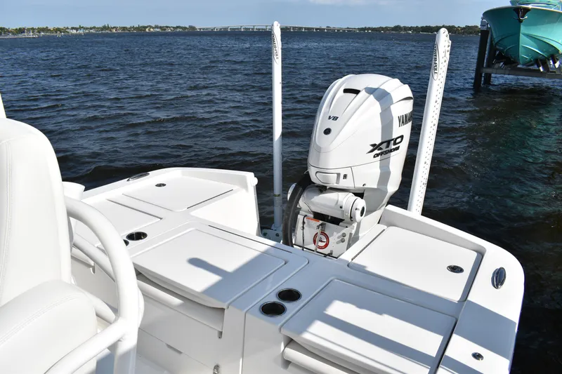 Slide: The Image of 2024 Regulator 26XO boat with Yamaha XTO engine on a sunny day. - 4