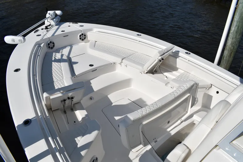 Slide: The Image of 2024 Regulator 26XO boat interior with spacious seating and modern design. - 9